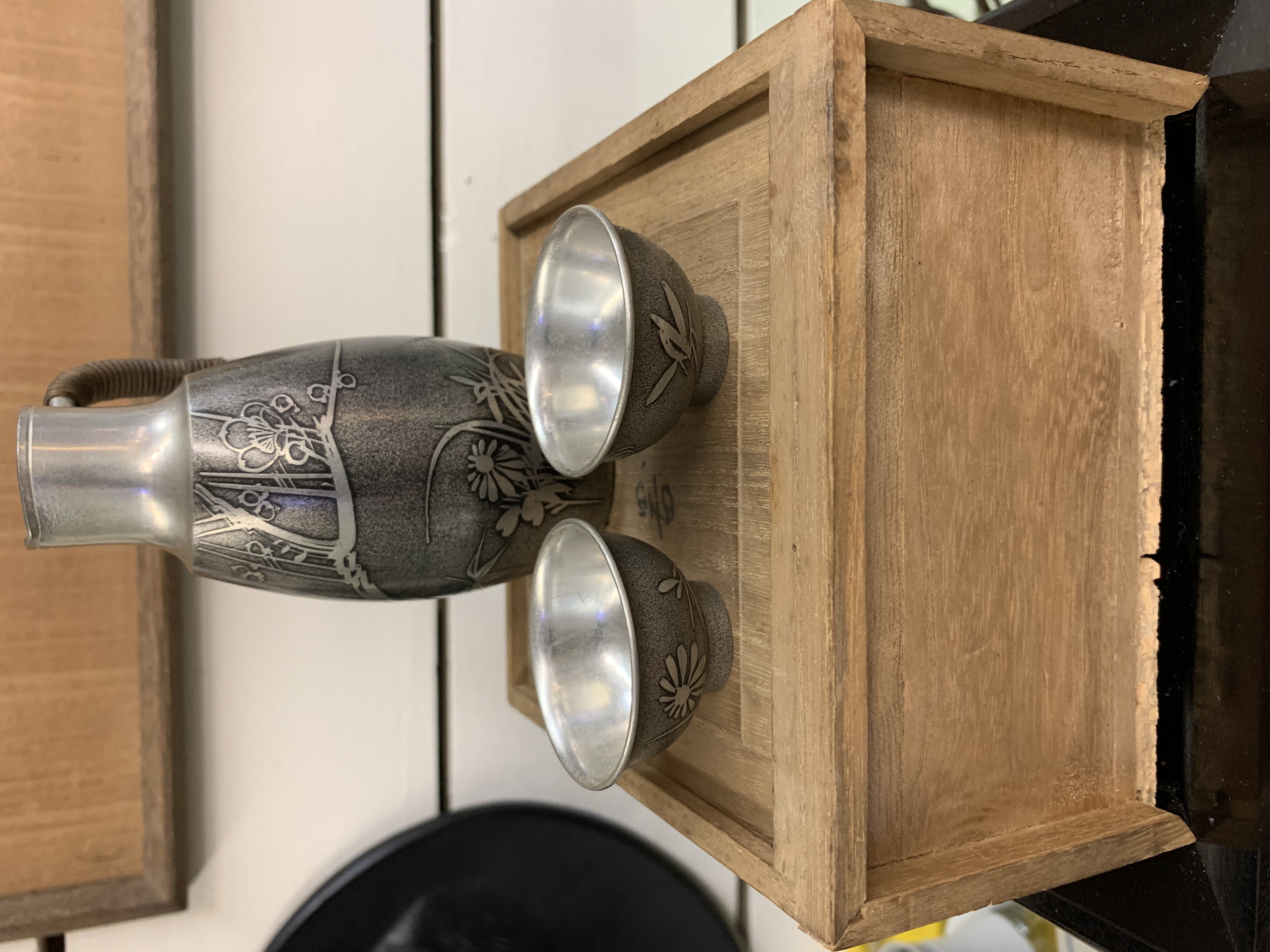Boxed set of pewter sake cups and jug