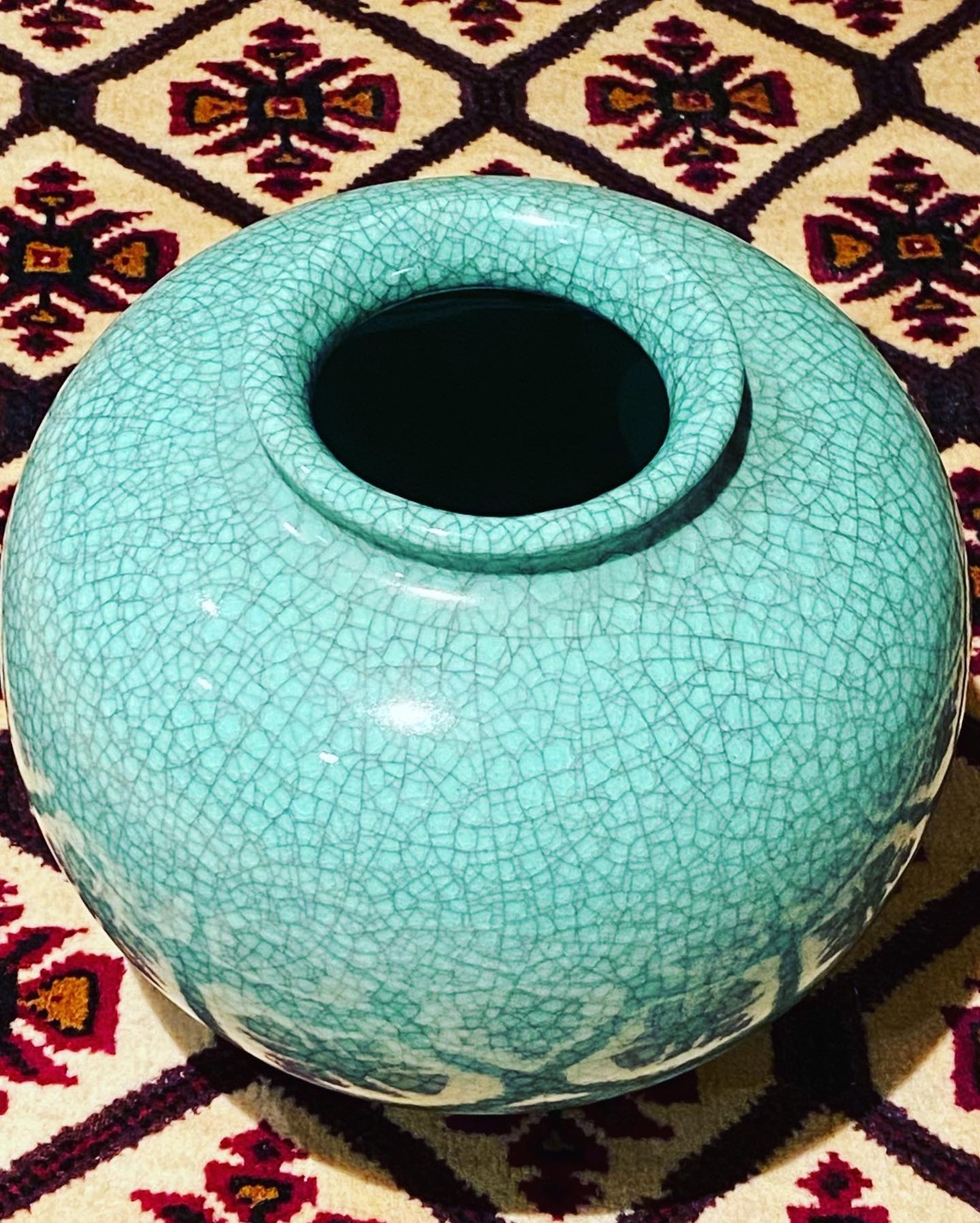 Green crackle globe vase